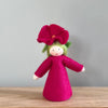 A felt Petunia Flower Fairy wearing a magenta  dress and Petunia flower on her head with light skin tone | © Conscious Craft